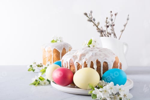 Preview: Easter cake decorated spring fresh flowers. Close up.