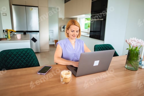 Preview: Working from home in a modern kitchen setting