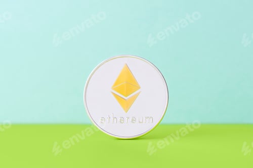 Preview: Silver Ethereum coin with a golden symbol on a bright two-tone background.