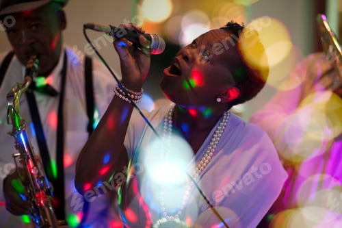 Preview: Band playing with woman singing
