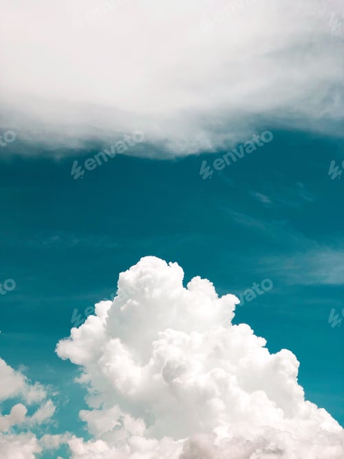 Preview: Deep blue sky and white puffy clouds