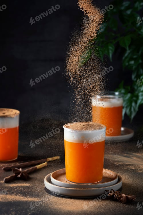 Preview: Winter ornage drink with milk, cinnamon and pumking