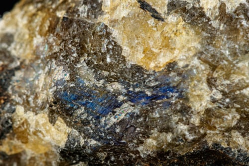 Preview: macro mineral stone Labradorite on a black background