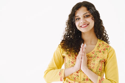 Preview: Beautiful portrait of young woman against white background