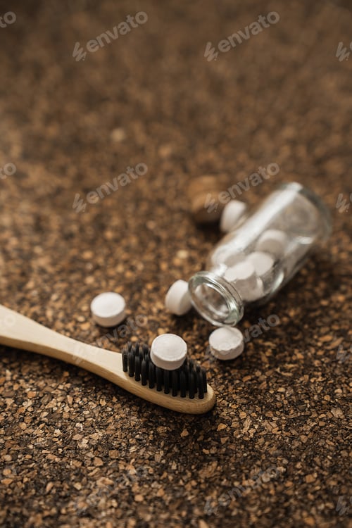 Preview: Bamboo Toothbrush and Toothpaste Tablets on Cork Surface