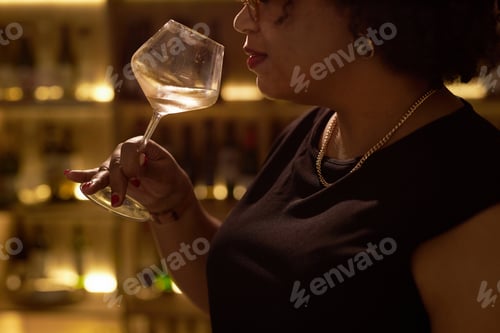 Preview: Unrecognizable Woman and Glass of Wine