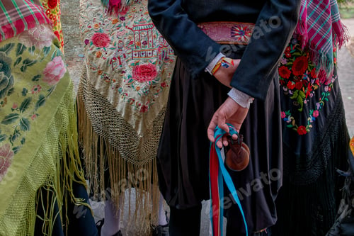 Preview: Close-up shot of a group of traditionally-dressed Maragatos walking on a street in Castilla y Leon