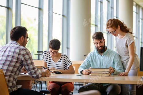 Preview: Education campus friendship people concept. Group of happy students studying together in library