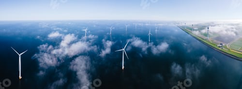 Preview: Windmill turbines at sea a huge winmill park in the Netherlands during winter