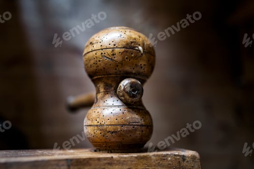 Preview: Close-up of wooden hammer in workshop