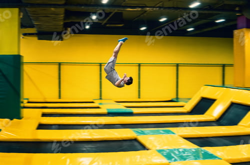 Preview: trampoline jumper performs acrobatic exercises on the trampoline