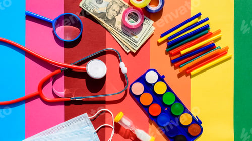 Preview: School supplies and protective mask during classes on a colorful and cheerful background.
