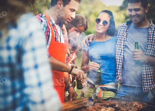 Preview: Friends having a barbecue party in nature