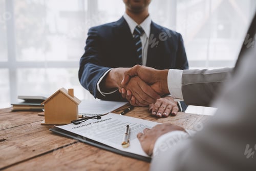 Preview: Handshake of real estate brokers with customers or investors, mortgage loan agreements Make a lease-
