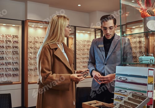 Preview: Woman is choosing new frames for glasses