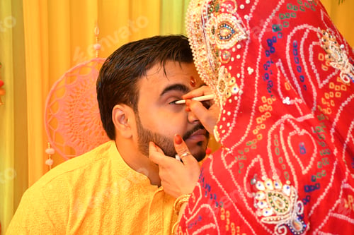 Preview: Sister applying kajal in her brother's eyes