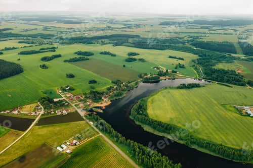 Preview: view from the height of the Lake in a green field in the form of a horseshoe and a village in the