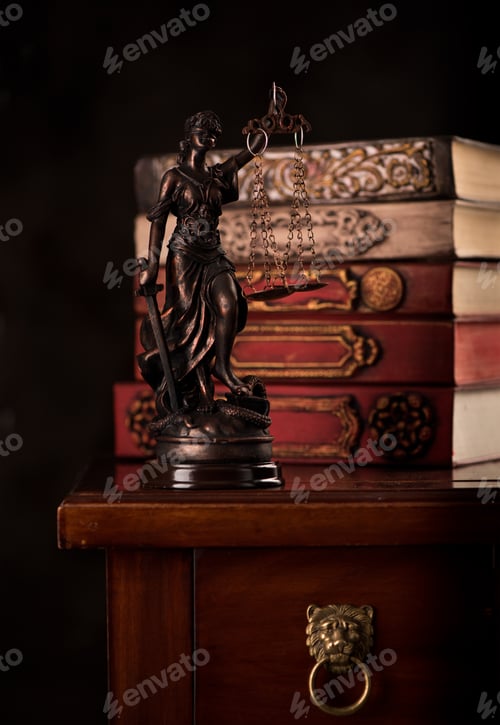 Preview: Law and justice concept. Statue Justice and books