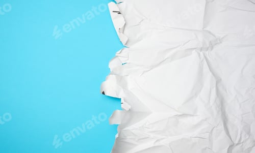 Preview: Crumpled white paper with torn edges