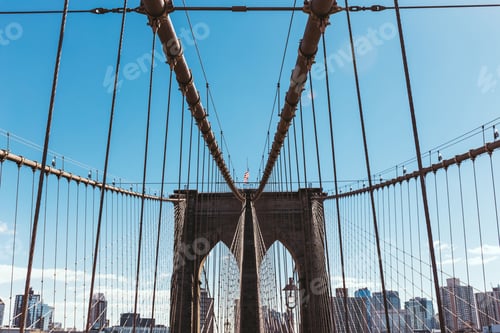 Preview: brooklyn bridge on blue sky and manhattan on background, new york, usa