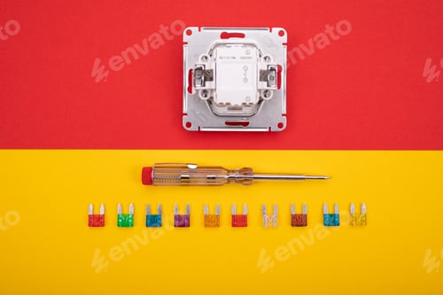 Preview: Set of electrical tool and white socket on colorful background