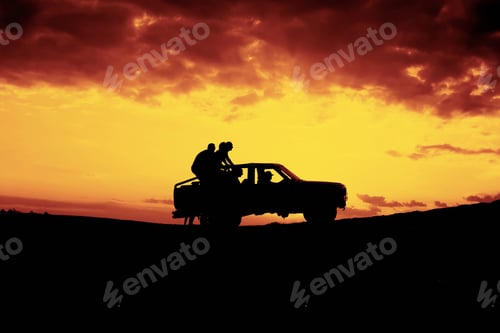 Preview: People on car rider at Sand dune during Sun set