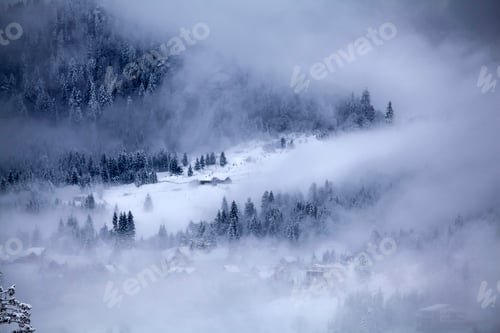 Preview: Wooden houses under snow