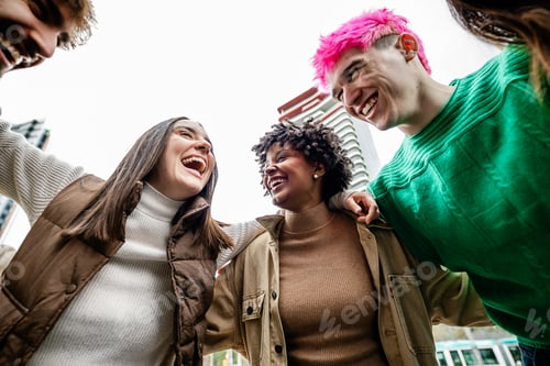 Preview: Smiling Friends Laughing Together in City Center