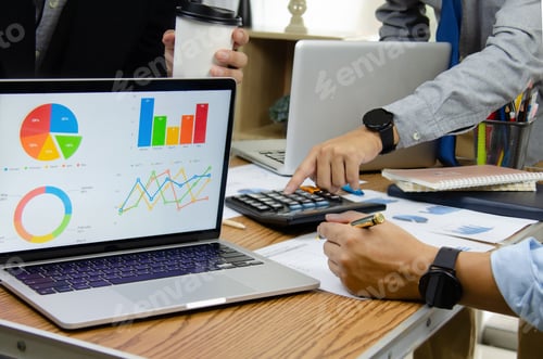 Preview: Business people meeting at the office by analyzing data from financial