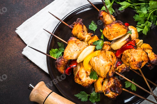 Preview: Chicken kebab with vegetables on skewers top view