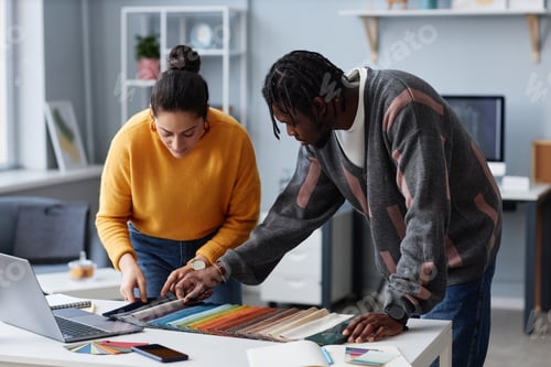 Preview: Couple of designer choosing color for interior