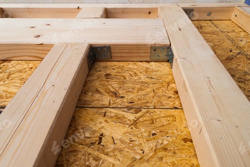 Preview: Construction of wood frame walls of a new country house site. Unfinished construction work inside.
