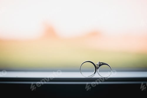 Preview: Two wedding rings in infinity sign. Love concept.