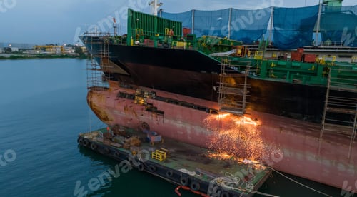 Preview: Cargo container ship at dry dock concept maintenance service working in the sea. Insurance