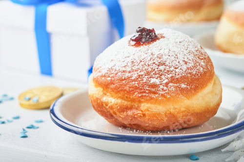 Preview: Happy Hanukkah. Hanukkah sweet doughnuts, gift boxes, white candles and chocolate coins on white woo