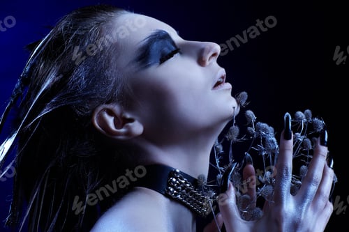 Preview: Cold-Tint Portrait Of Beautiful Girl With Bird Of Prey Make-Up, Hair-Do And Manicure With
