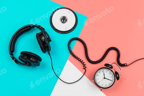 Preview: Headphones with cord on a bright color block background