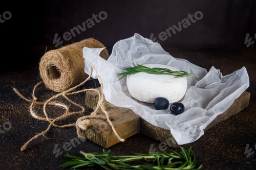 Preview: Camembert cheese with white mold, walnuts, honey and dried fruits. Dinner or aperitif concept.