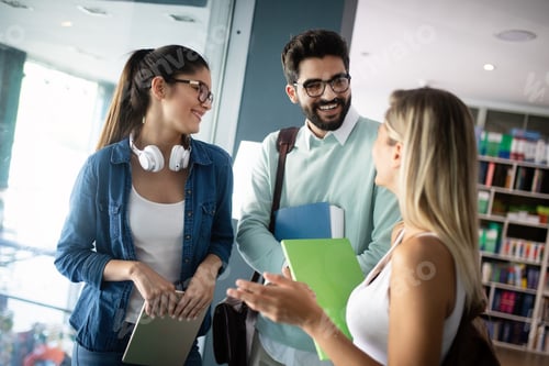Preview: Group of friends studying together at university campus