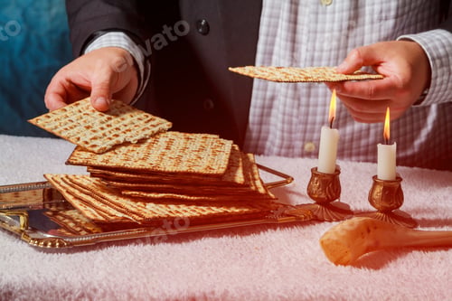 Preview: Sabbath kiddush ceremony composition with two wax candles in candlesticks and a traditional passover