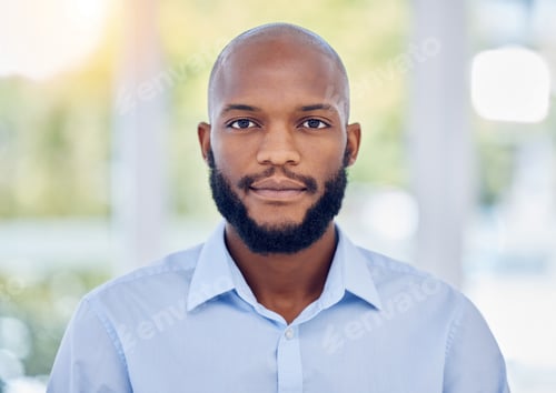 Professional Man Smiling Wearing a Light Blue Shirt