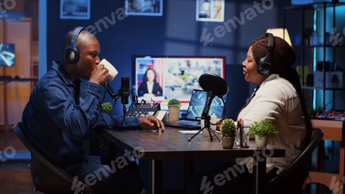 Preview: Show host recording podcast, enjoying cup of coffee and nice conversation with guest
