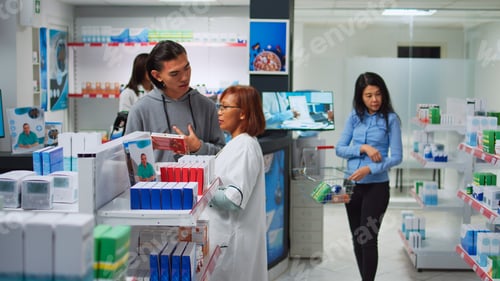 Preview: Female specialist using digital tablet to do medicine inventory