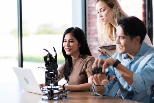 Preview: Young students researching inventions with modern technology