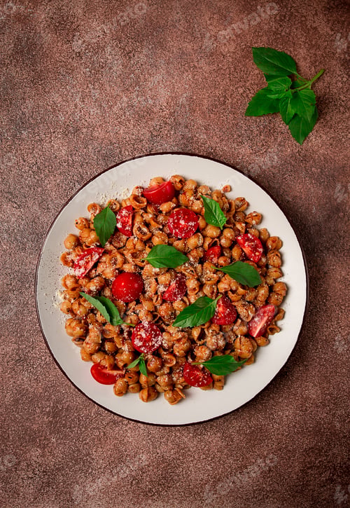 Preview: Tuscan pasta with smoked paprika and basil,parmesan cheese, Italian traditional cuisine,