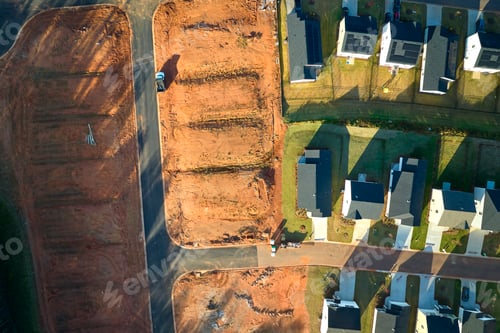 Preview: Real estate development with tightly located family houses under construction