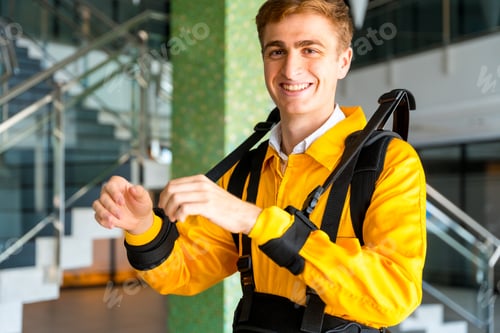 Preview: Portrait of an employee with an exoskeleton from a futuristic high-tech warehouse
