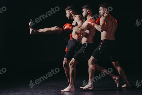 Preview: sequence shot of shirtless muscular boxer in boxing gloves doing kick