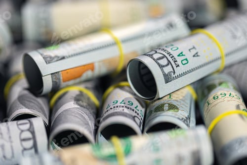 Preview: Close-up of twisted 100 dollar bills. Finance concept background.
