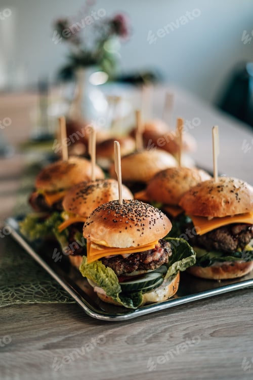 Preview: Delicious Appetizer Burgers with Cheese and Fresh Greens